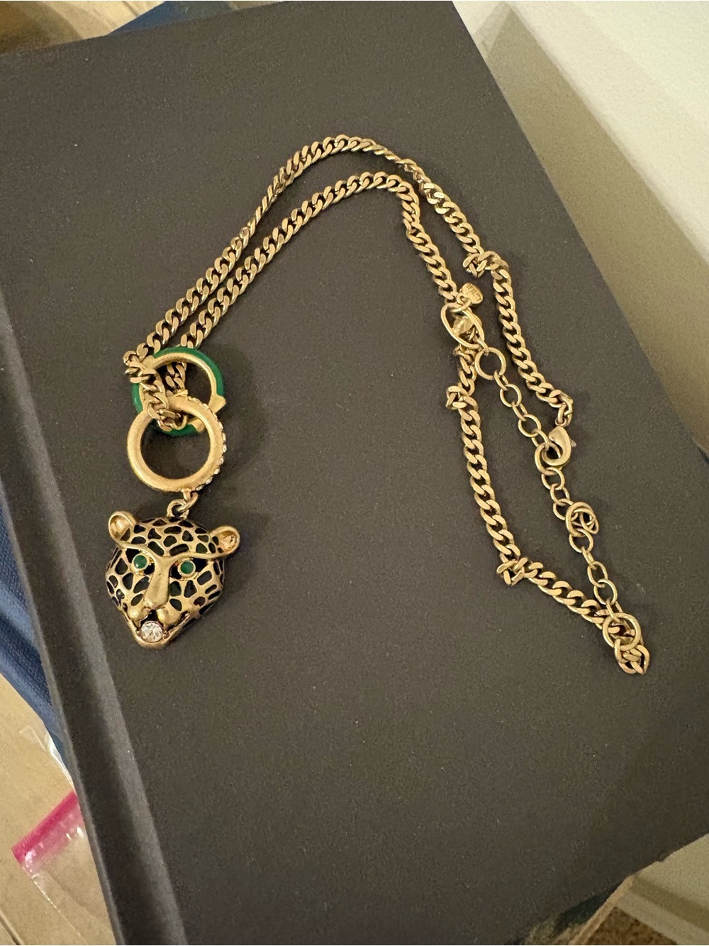 Gold-tone Jaguar Pendant Necklace with Green Accents